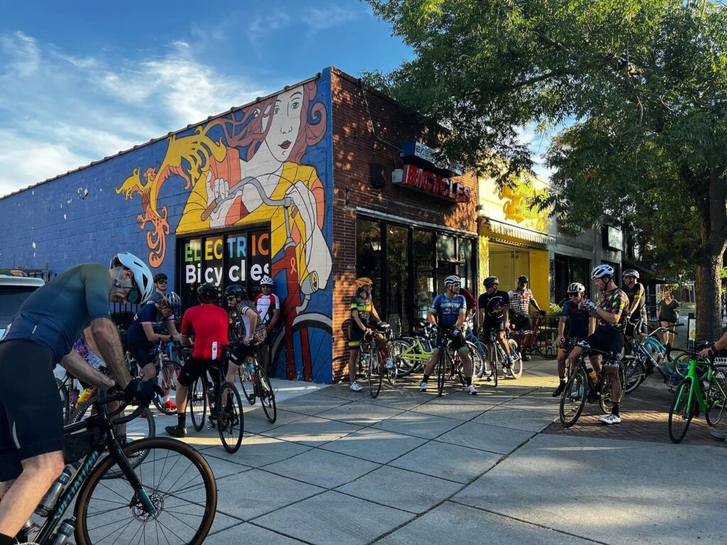 Large group of cyclists outside of East COast Bicycles store in Norfolk, VA.