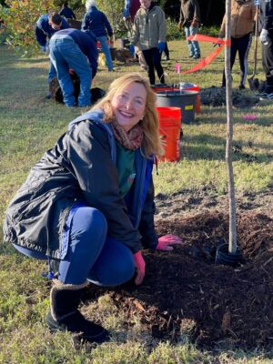 Liz Planting a tree